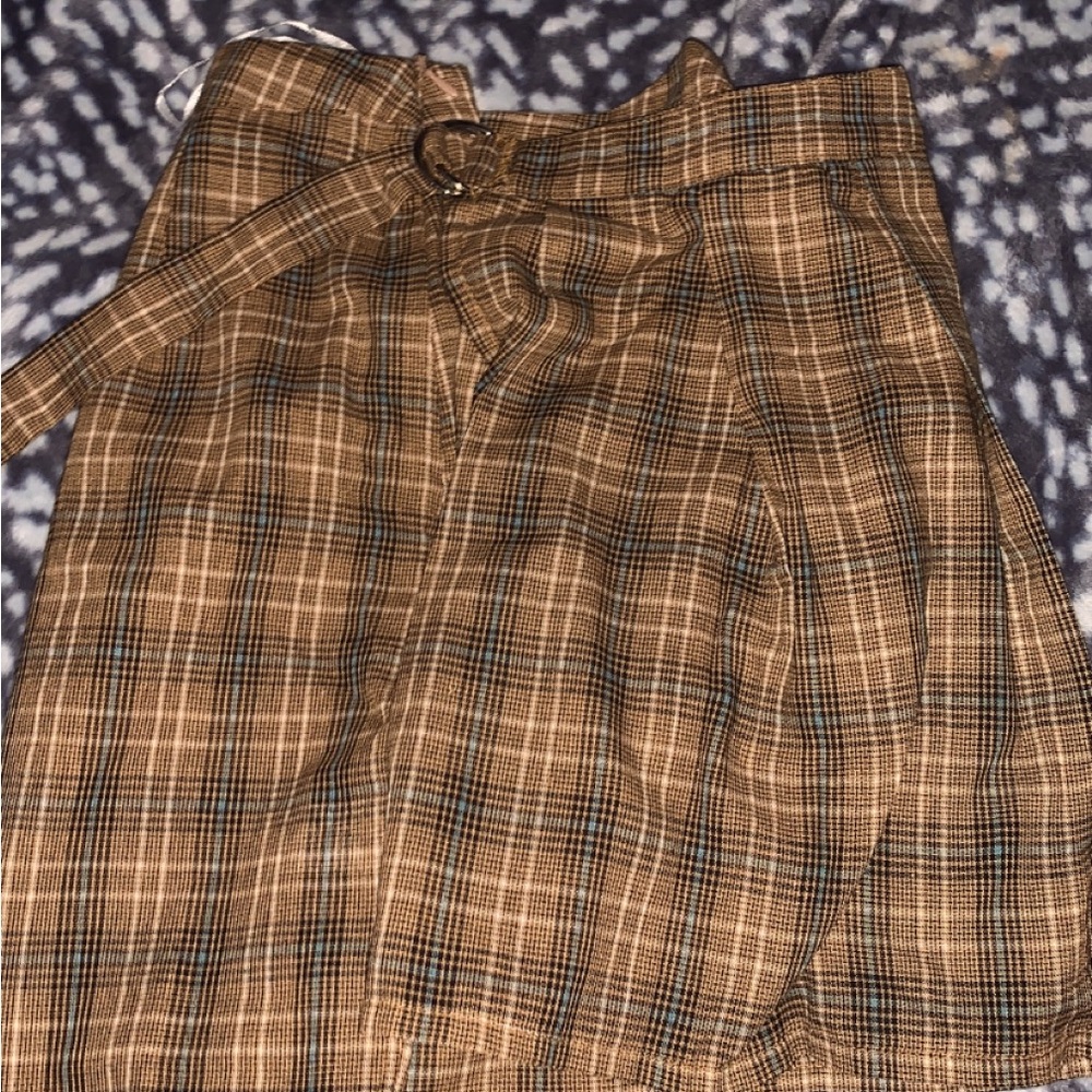 women's above knee length brown plaid skirt with attachment belt to adjust size